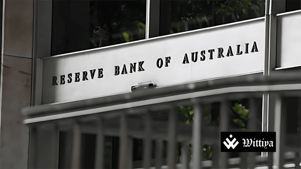 Reserve Bank of Australia logo with a downward interest rate arrow, symbolizing the rate cut to 4.10% amid inflation slowdown.