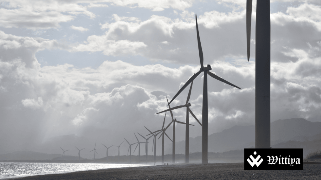 Solar panels and wind turbines representing China’s decision to cut renewable energy subsidies after rapid expansion.