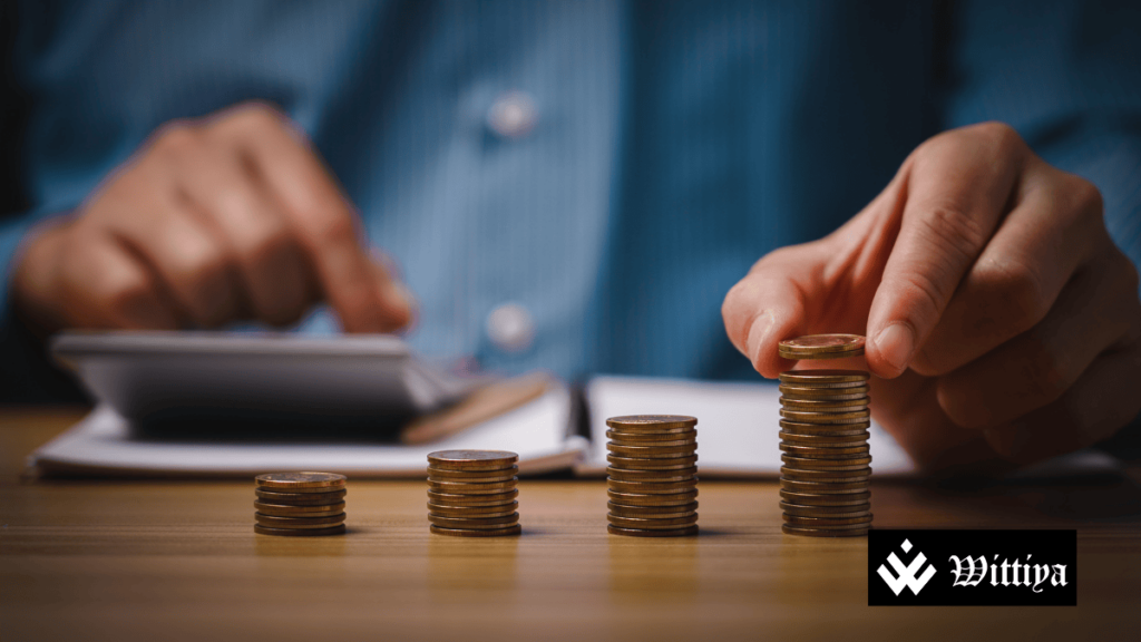Person calculating coins symbolizing interim dividends by top Indian firms on February 7