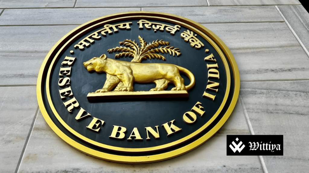 Indranil Bhattacharyya with the Reserve Bank of India (RBI) logo.