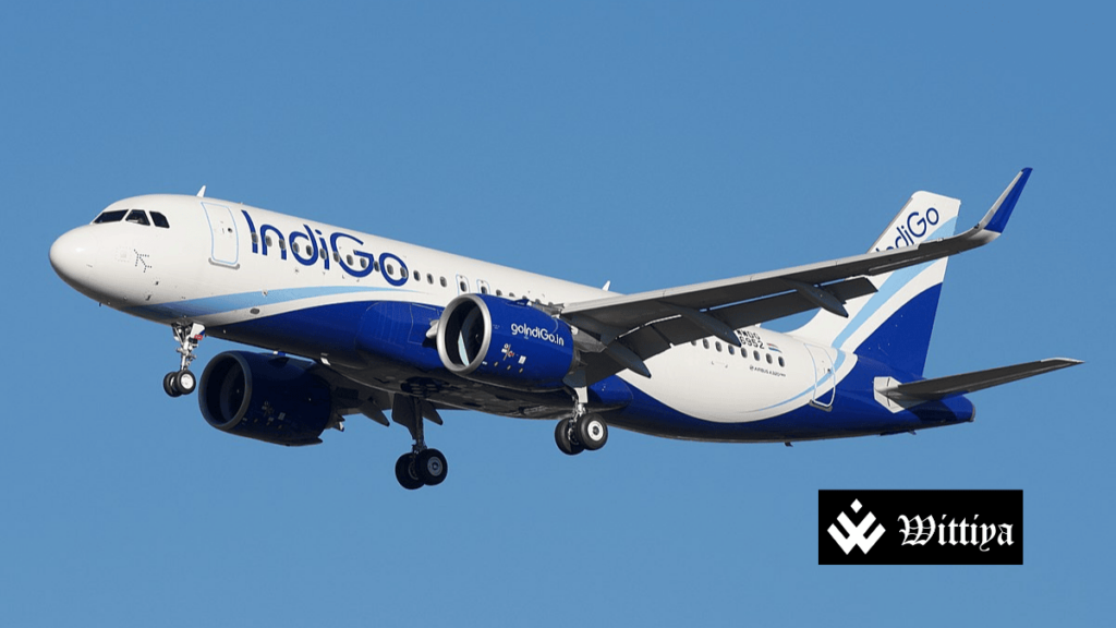 IndiGo airplane flying in the sky.