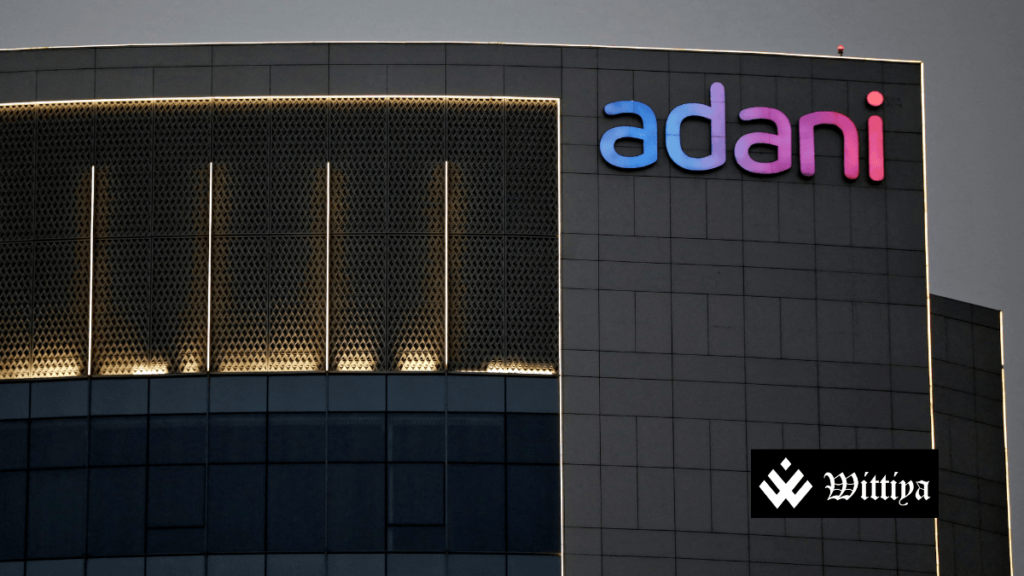 Adani Renew Exim DMCC and ITD Cementation logos with acquisition announcement.