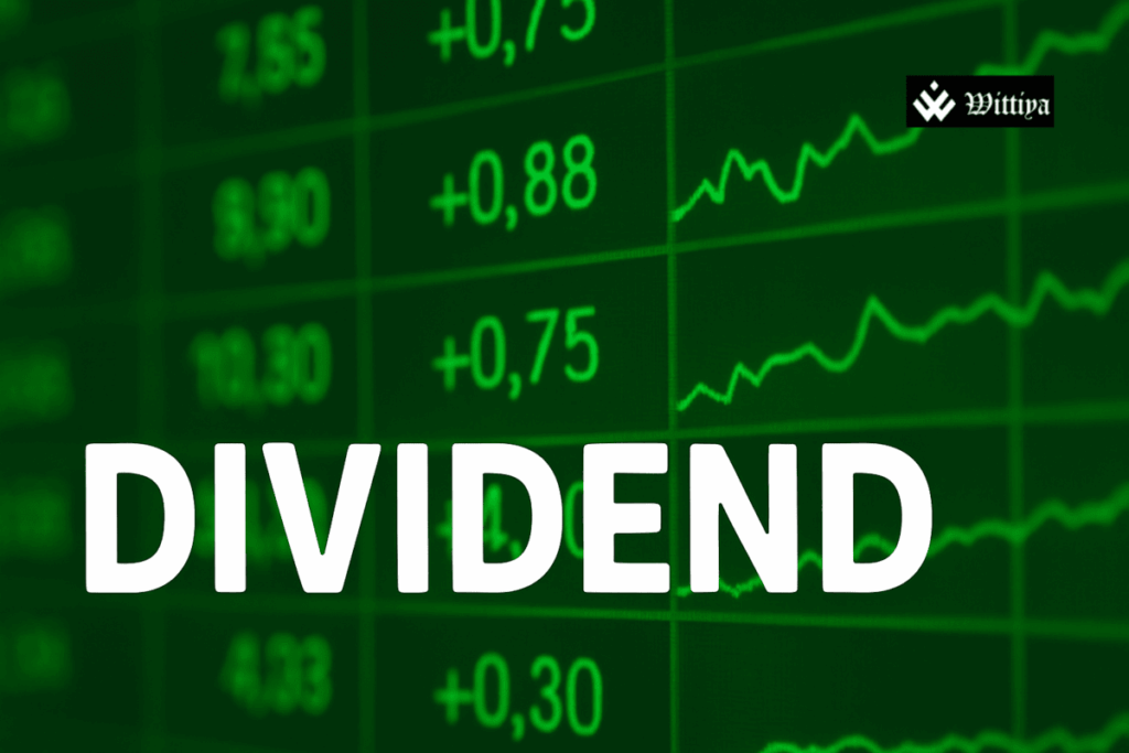 Stacks of dividend checks and company logos representing Indian firms announcing significant dividends in April 2025​